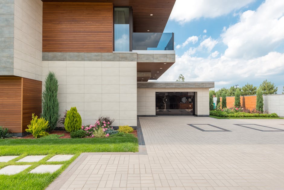 Adelaide home with freshly poured exposed aggregate concrete driveway