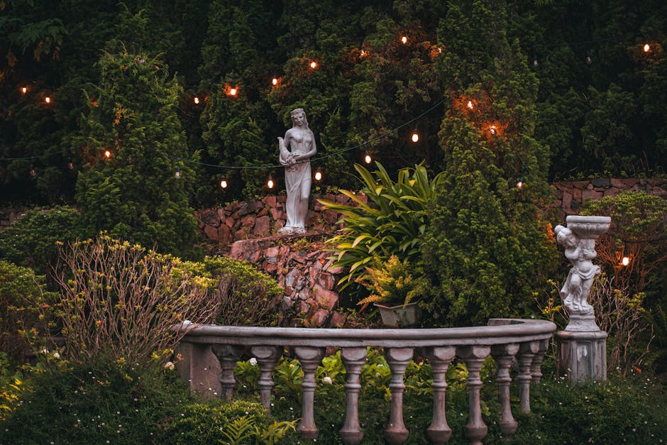 Adelaide garden at dusk with feature uplighting on tree, path lights and pergola downlights