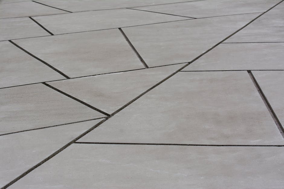 Adelaide patio split between limestone and bluestone paving for comparison
