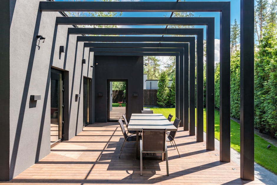 Adelaide attached timber pergola with polycarbonate roof and outdoor dining furniture